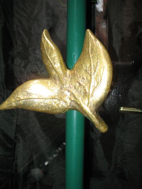 Türgriff in Form eines Teeblattes