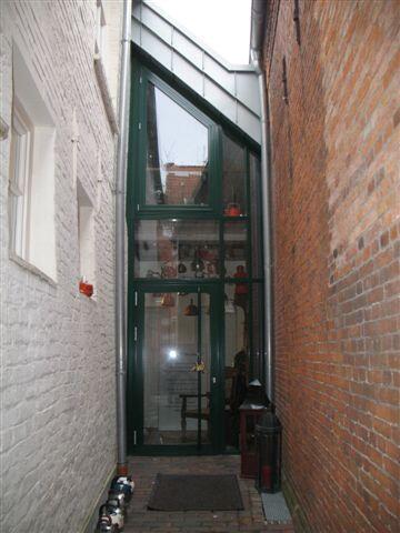 Türgriff in Form eines Teeblattes